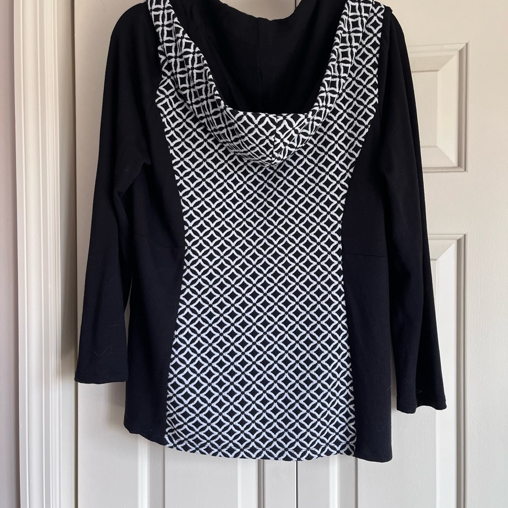 Black and white hooded dress jacket.